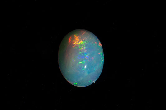 Ethiopian opal 1.02ct oval cabochon