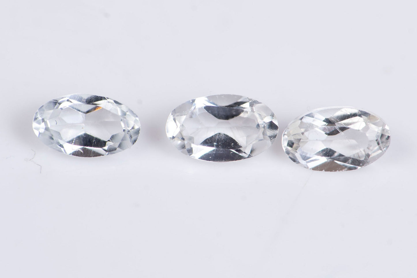 3 броя бял топаз 0.91ct 5x3mm овална шлифовка