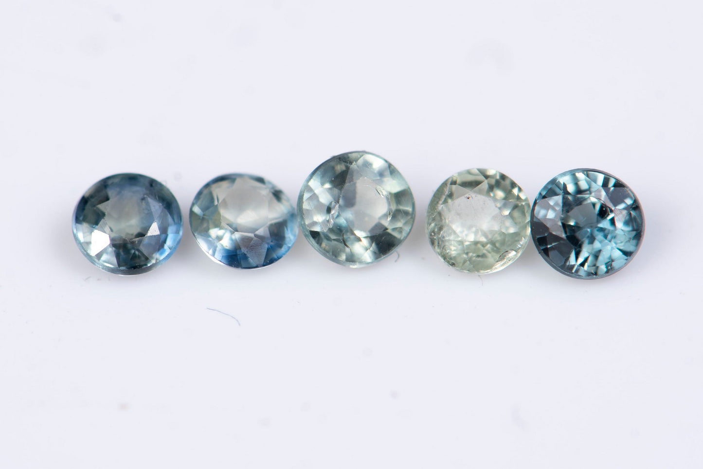 5 pieces blue green sapphire 0.55ct 2.6mm heated round cut