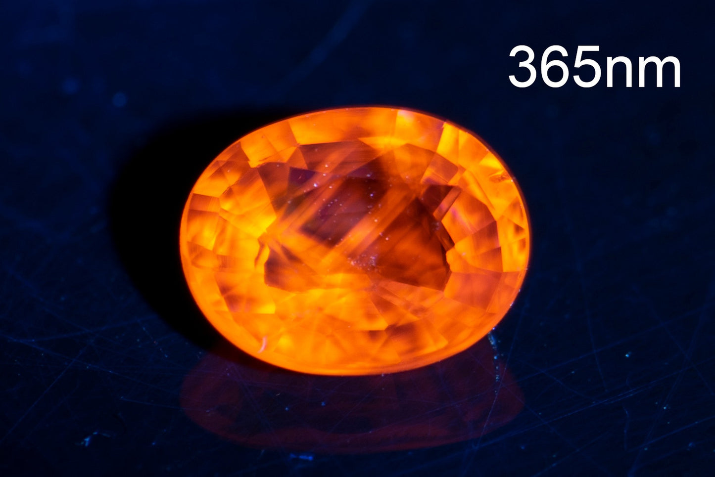 Light yellow sapphire 0.60ct VS oval cut orange fluorescence