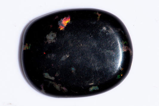 Черно опализирано дърво 13.73ct овален кабошон