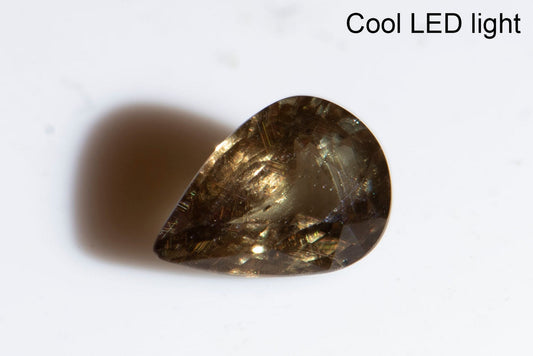 Color changing garnet 0.63ct teardrop cut