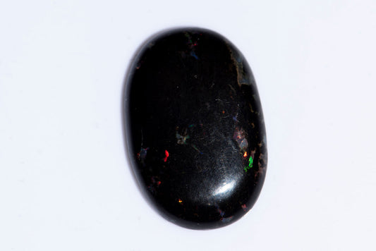 Черно опализирано дърво 10.73ct овален кабошон