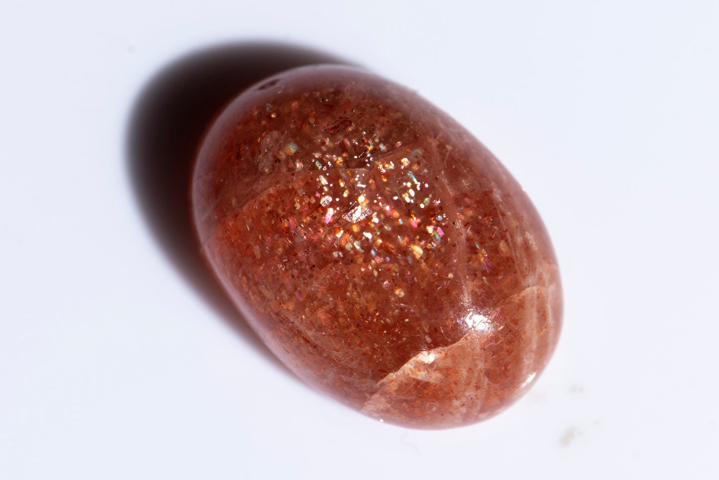 Слънчев камък конфети 13.7ct овален кабошон