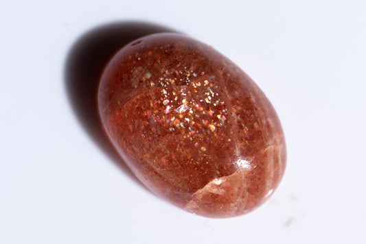 Confetti sunstone 13.7ct oval cabochon
