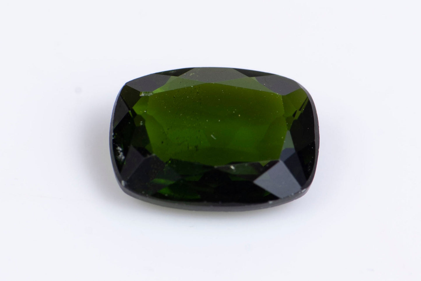 Chrome diopside 0.86ct 7x5mm cushion cut