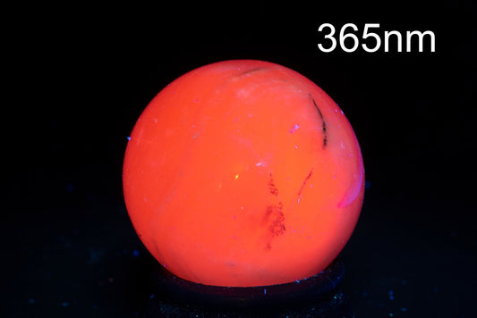 Fluorescent manganocalcite sphere 38mm 77g