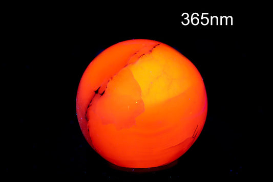 Fluorescent manganocalcite sphere 49mm 168g