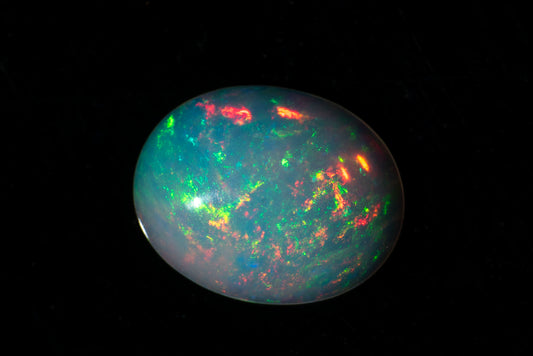 Ethiopian opal 0.88ct 9x7mm oval cabochon