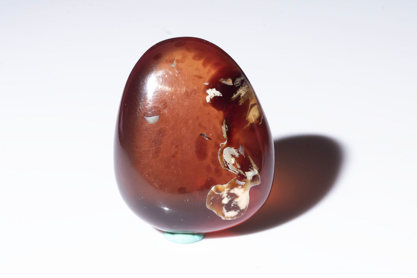Син кехлибар от Индонезия, 56.5ct полиран