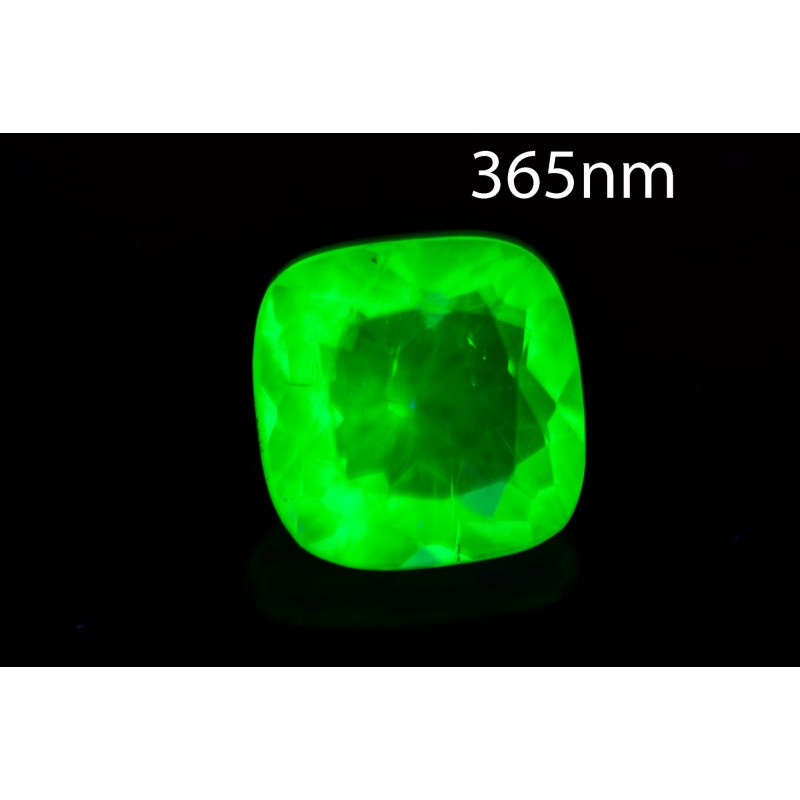 Hyalite opal 0.67ct 5.8mm cushion cut fluorescent