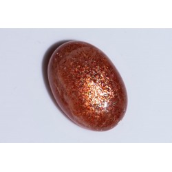 Big sunstone confetti 30.3ct oval cabochon
