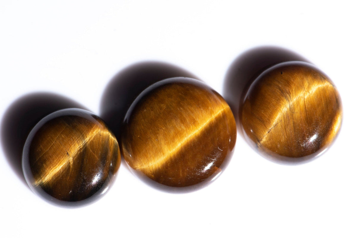 Natural tiger's eye round cabochons with golden-brown silky bands