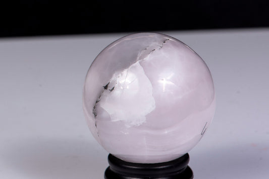 Fluorescent manganocalcite sphere 49mm 168g