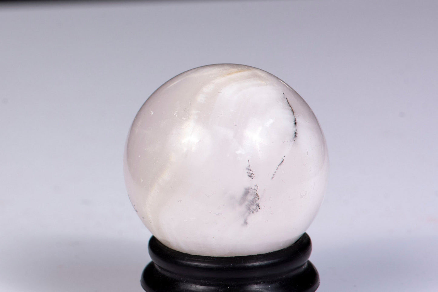 Fluorescent manganocalcite sphere 38mm 77g