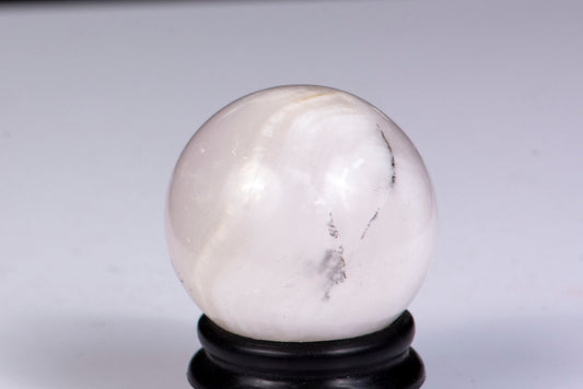 Fluorescent manganocalcite sphere 38mm 77g