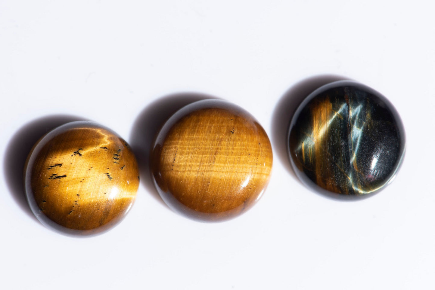 3 pieces tiger's eye 34.9ct round cabochons