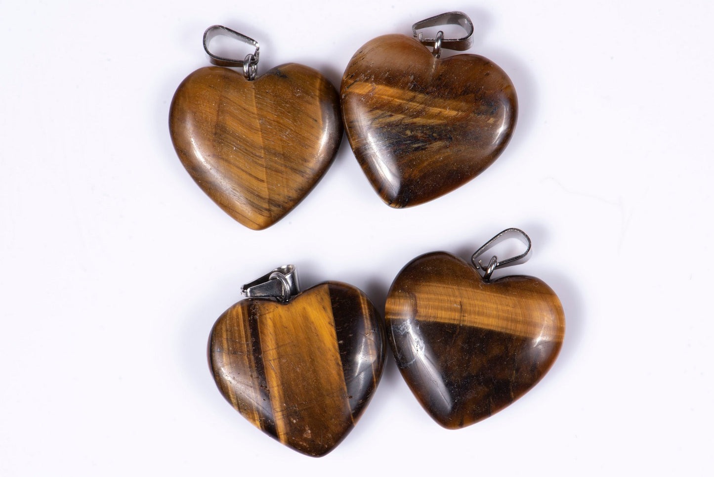 4 pieces tiger's eye heart pendants 20mm 64ct