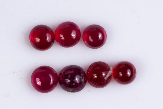 7 pieces ruby 0.56ct heated round cabochons