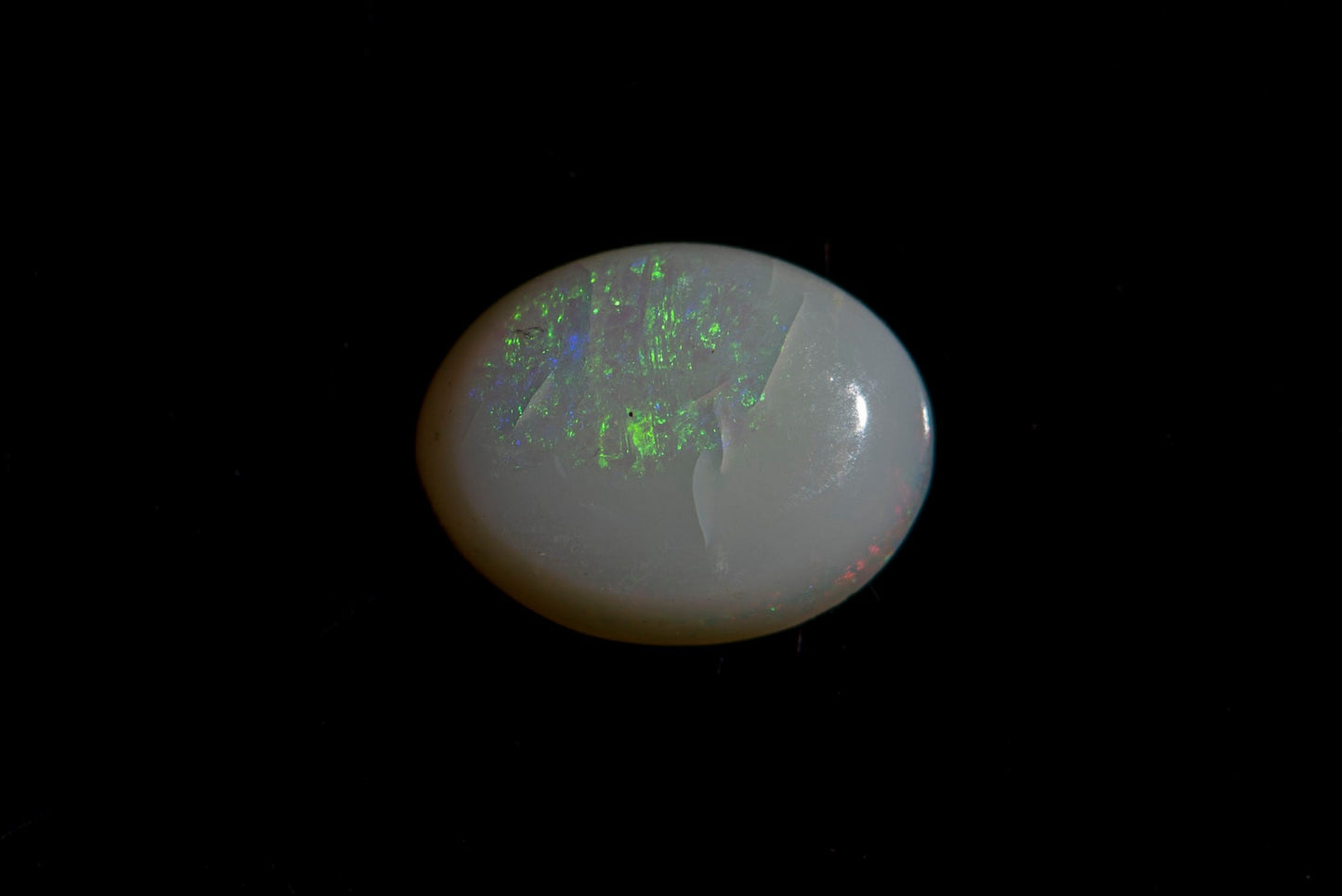 Австралийски бял кристален опал 1.30ct овален кабошон