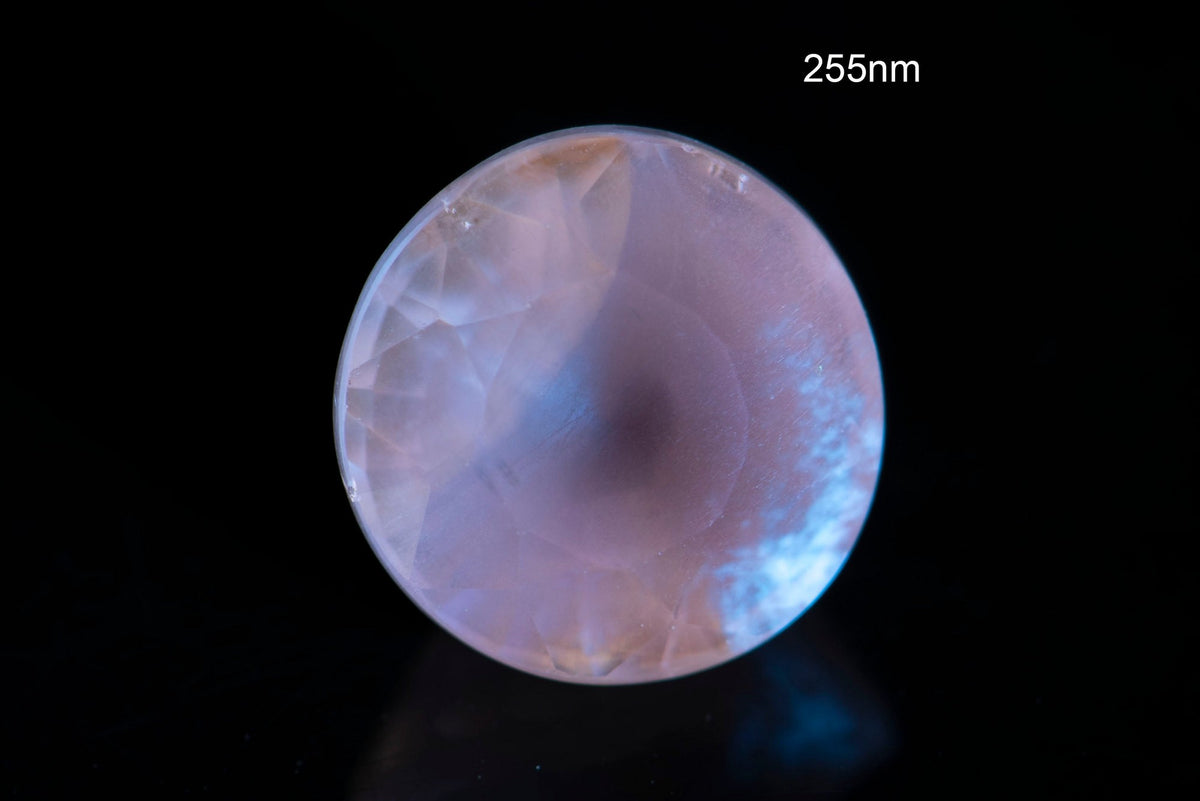 Natural White Zircon 6.6mm 2.19ct Untreated Round Cut Interesting Fluorescence