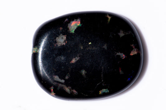 Черно опализирано дърво 13.73ct овален кабошон