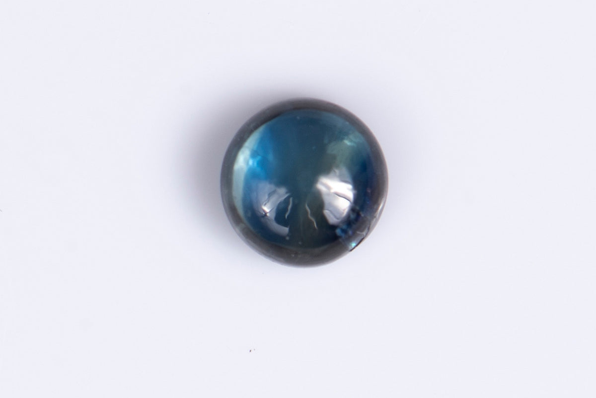 Естествен син сапфир 0.58ct 4.4mm, нагряван, кръгъл кабошон