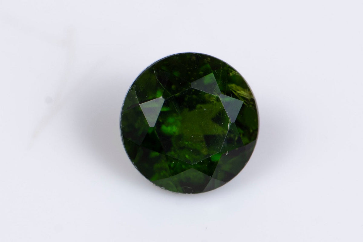 Естествен хром диопсид 0.60ct 5mm кръгла шлифовка