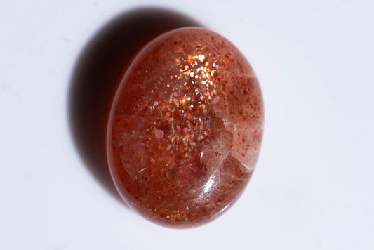 Confetti sunstone 13ct oval cabochon