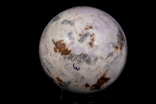 Fluorescent hackmanite sphere 291g 58mm