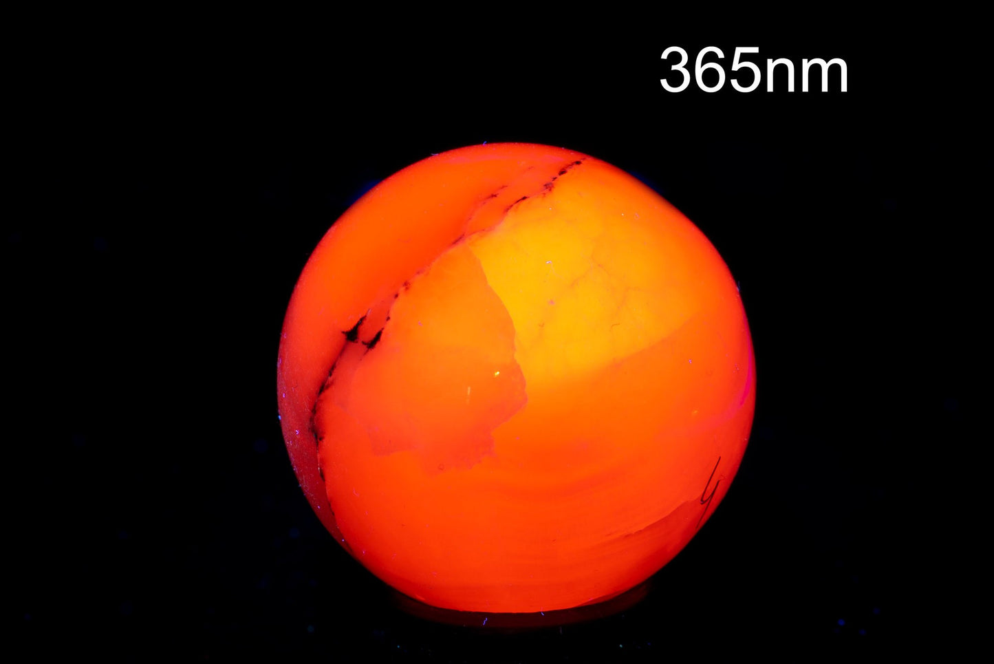 Fluorescent manganocalcite sphere 49mm 168g