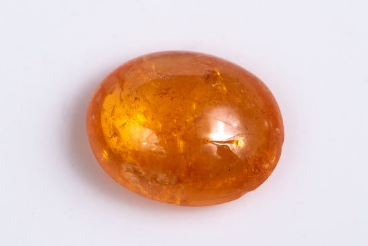 Spessartine garnet Fanta color 1.37ct oval cabochon