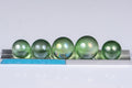 Natural green aura quartz sphere iridescent crystal collectible