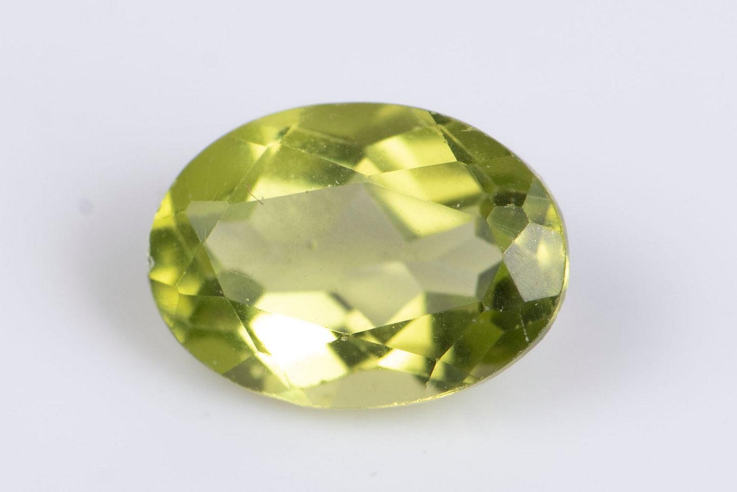 Green peridot 0.84ct 7x5mm oval cut