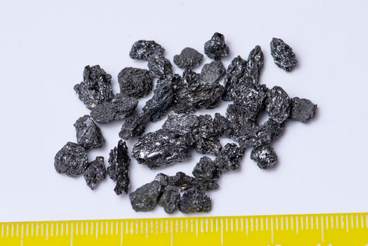 Grey rough diamonds in kimberlite - price for 1ct