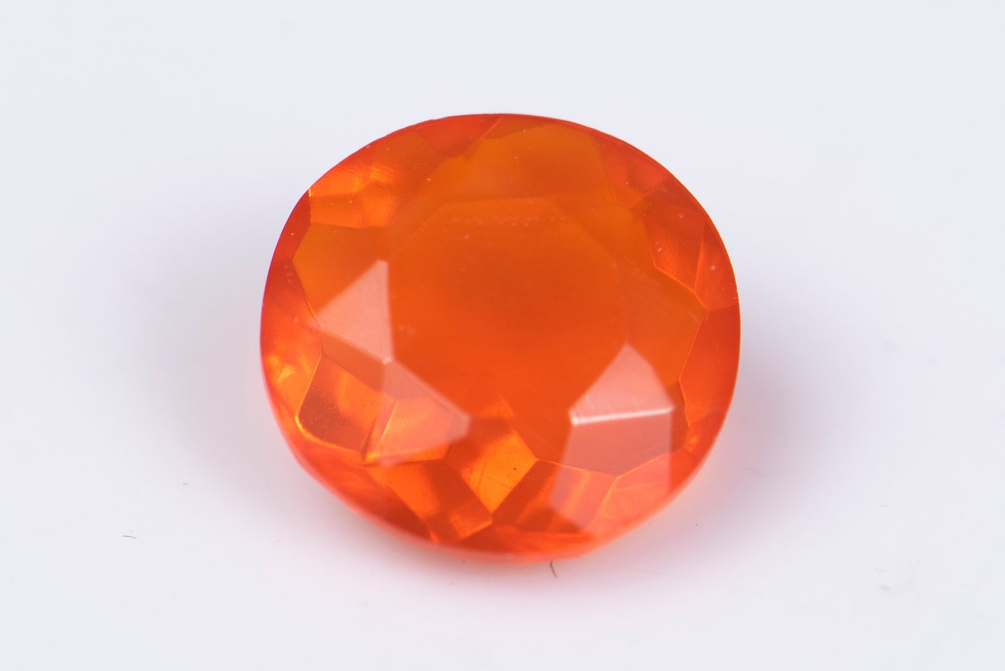 Мексикански огнен опал 0.54ct 6.4mm кръгла шлифовка