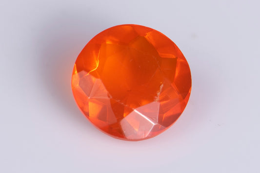 Мексикански огнен опал 0.59ct 6.5mm VS кръгла шлифовка