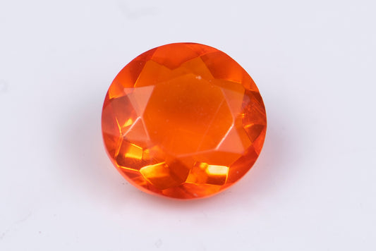 Мексикански огнен опал 0.64ct 6.5mm кръгла шлифовка