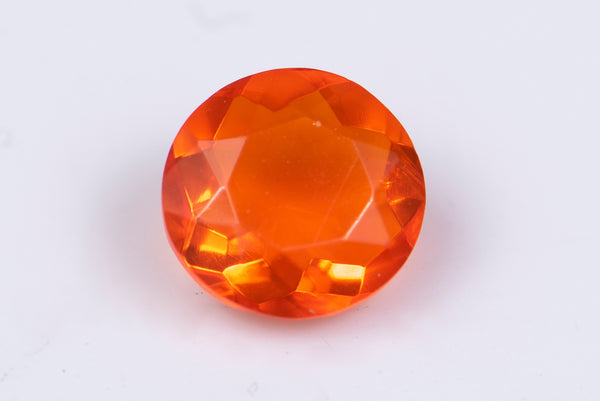 Естествен мексикански огнен опал 0.64ct 6.5mm кръгла шлифовка