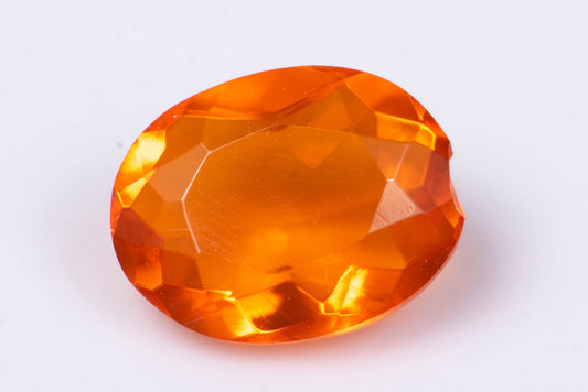 Мексикански огнен опал 0.73ct, овална шлифовка