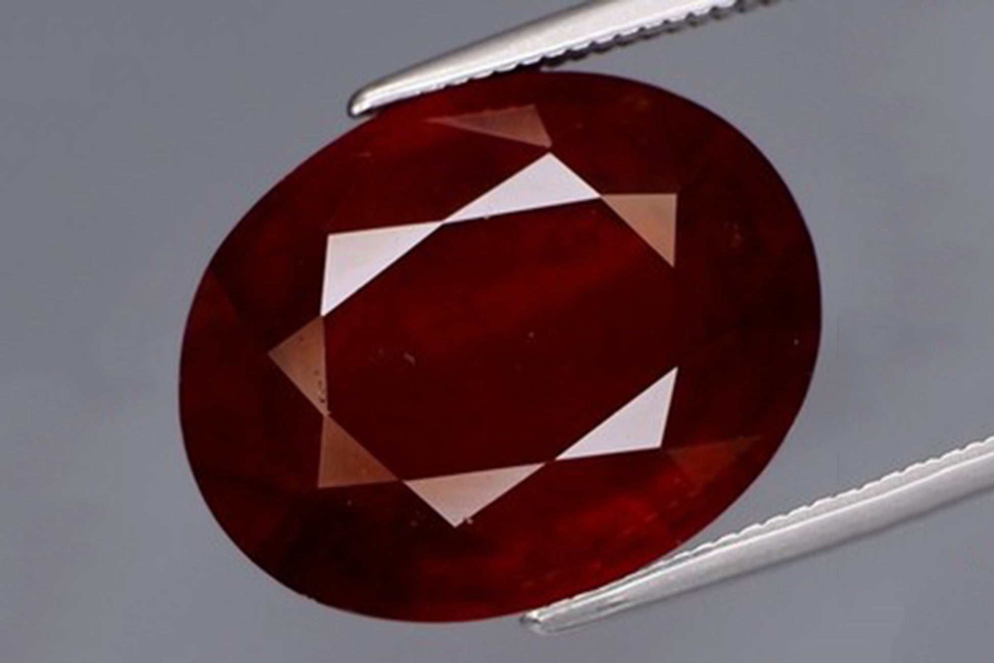 Natural orange spessartite garnet 11.98ct large oval cut loose gemstone