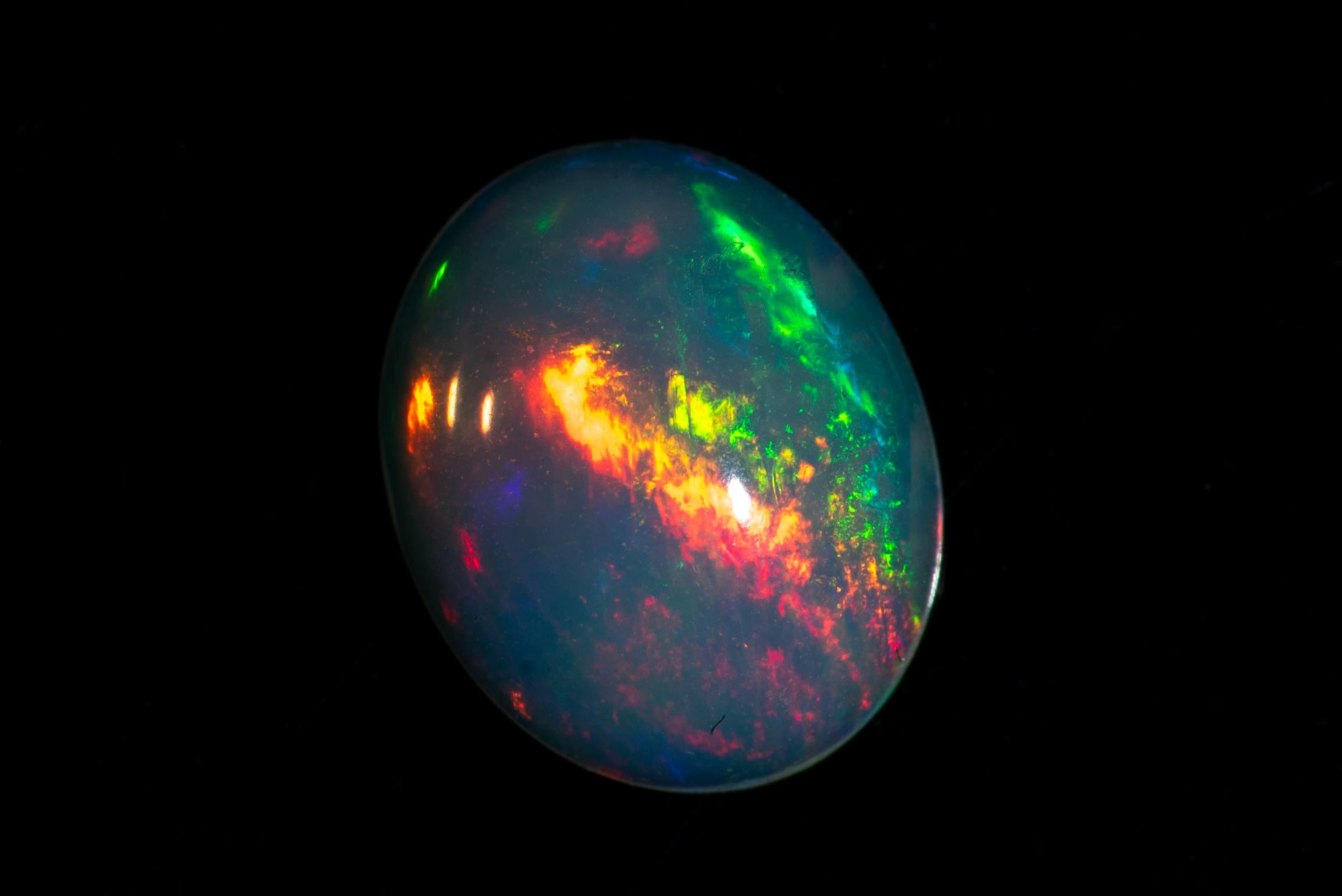 Natural Ethiopian opal 0.82ct 9x7mm oval cabochon loose gemstone