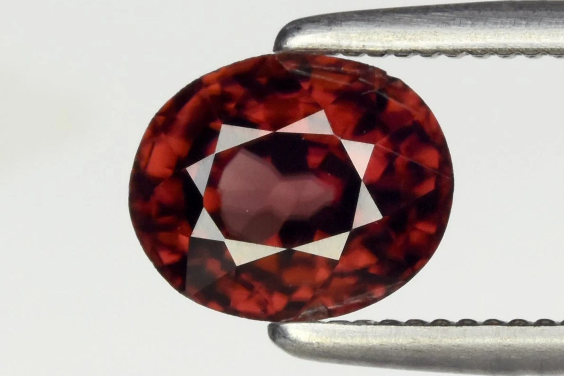 Natural imperial pink zircon 1.41ct 6.3x5.2mm VS untreated oval cut loose gemstone