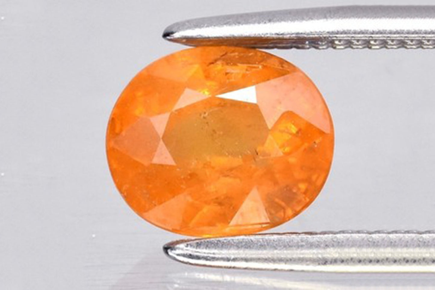 Natural spessartite garnet orange 1.07ct 6.2x5.2mm oval cut loose gemstone