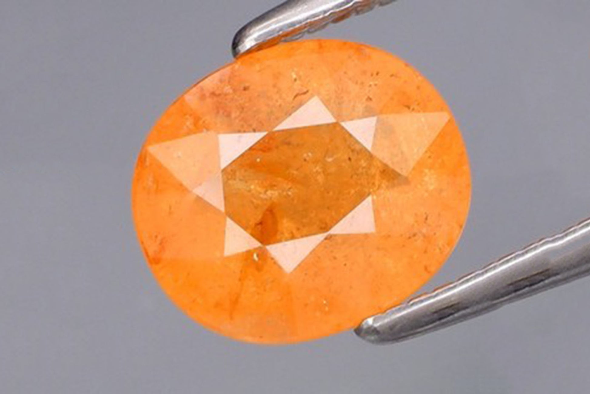 Natural orange spessartite garnet 1.97ct oval cut loose gemstone for jewelry