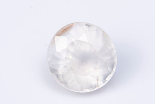 Natural white zircon 6.6mm 2.19ct untreated round cut interesting fluorescence