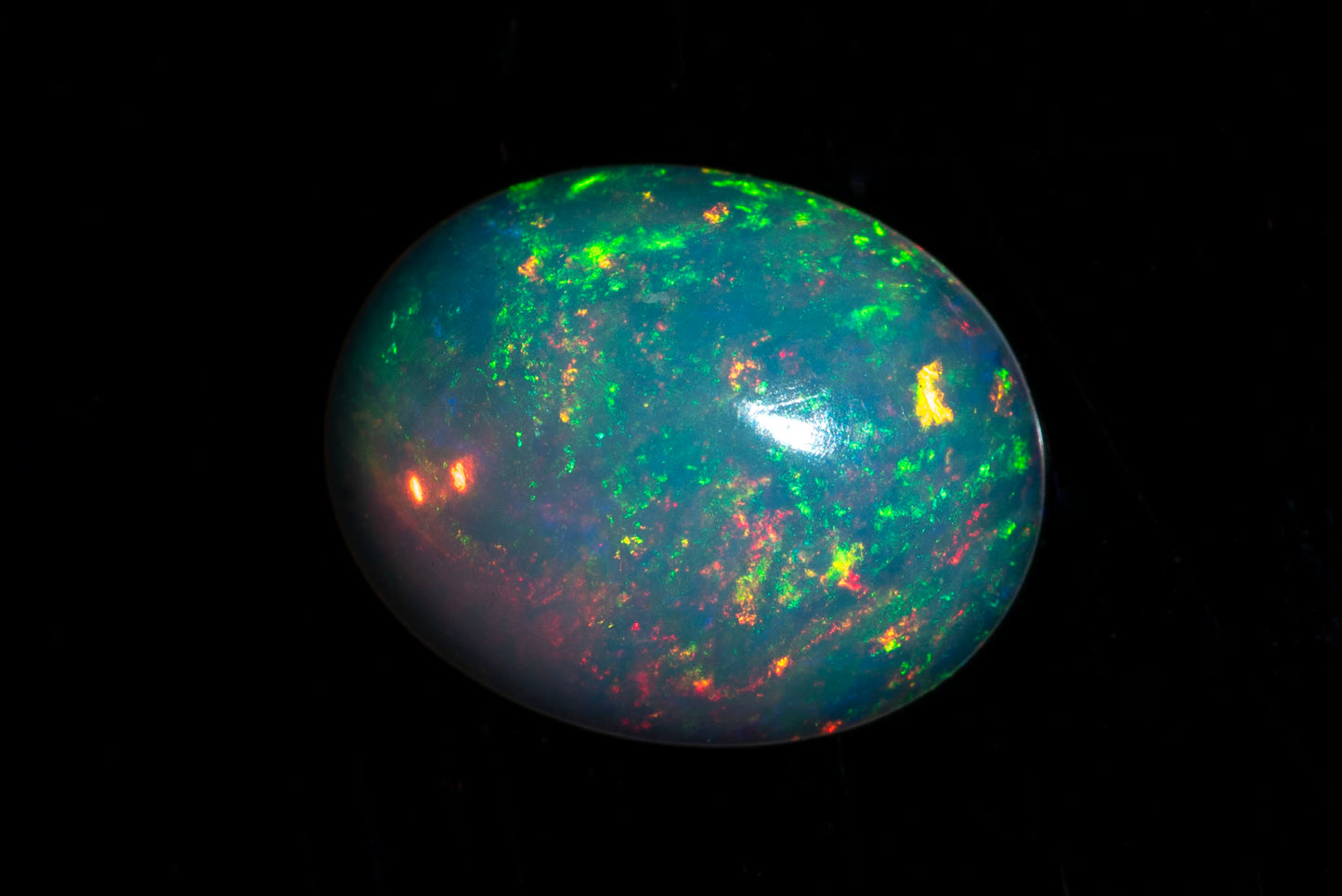 Ethiopian opal 0.88ct 9x7mm oval cabochon