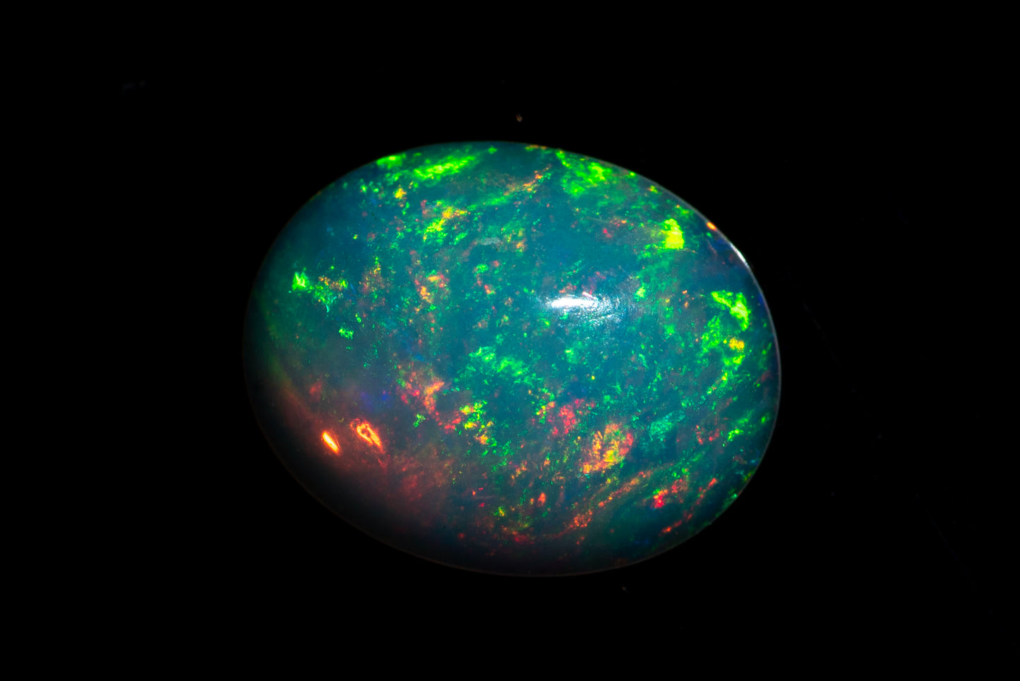 Ethiopian opal 0.88ct 9x7mm oval cabochon