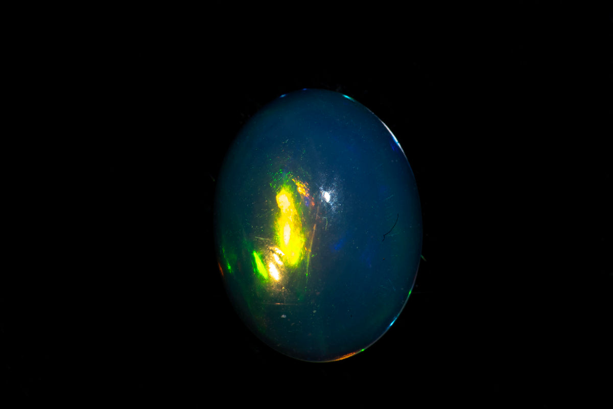 Natural Ethiopian Opal 0.82ct 9x7mm Oval Cabochon #1