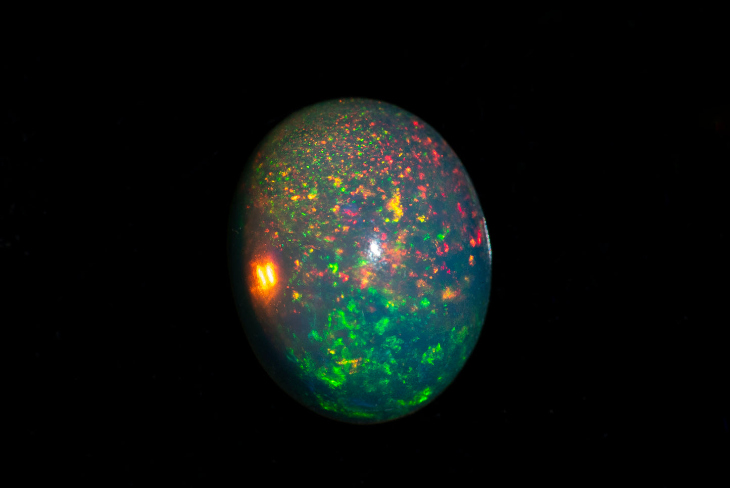 Ethiopian opal 1.05ct 9x7mm oval cabochon